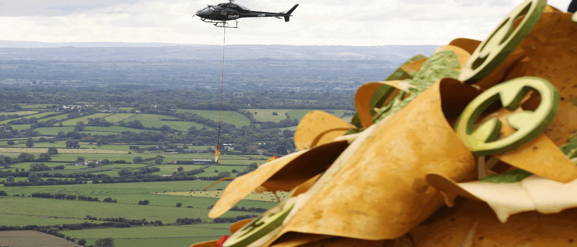 Helicopter flying over huge plate of nachos