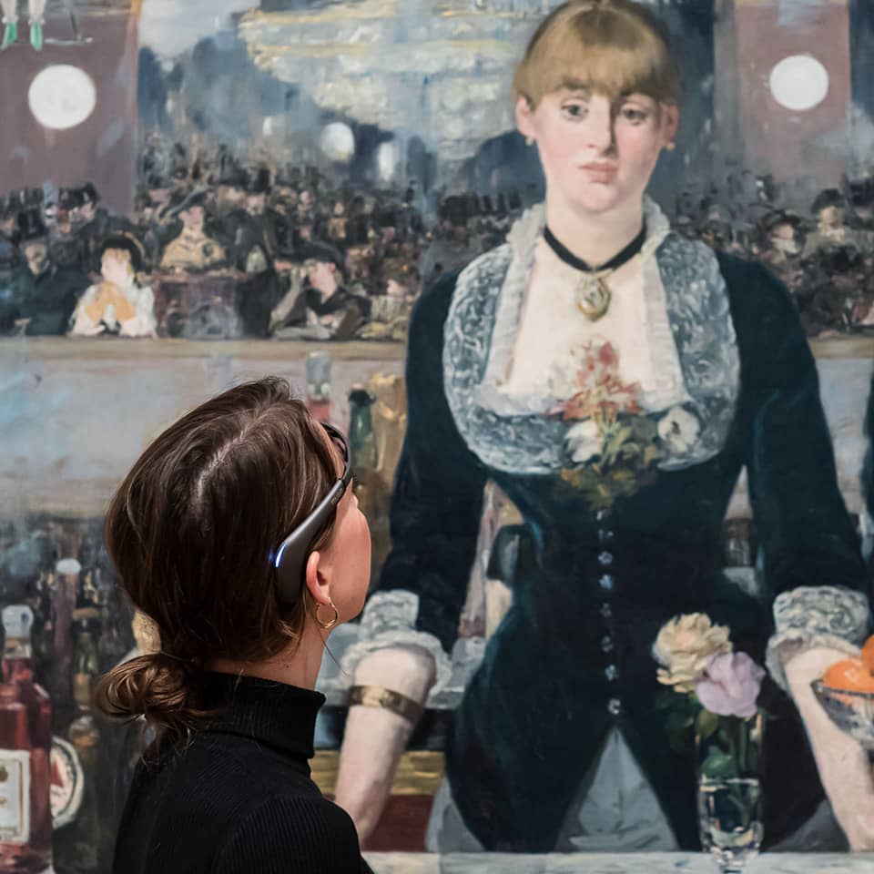 Woman watching at the painting