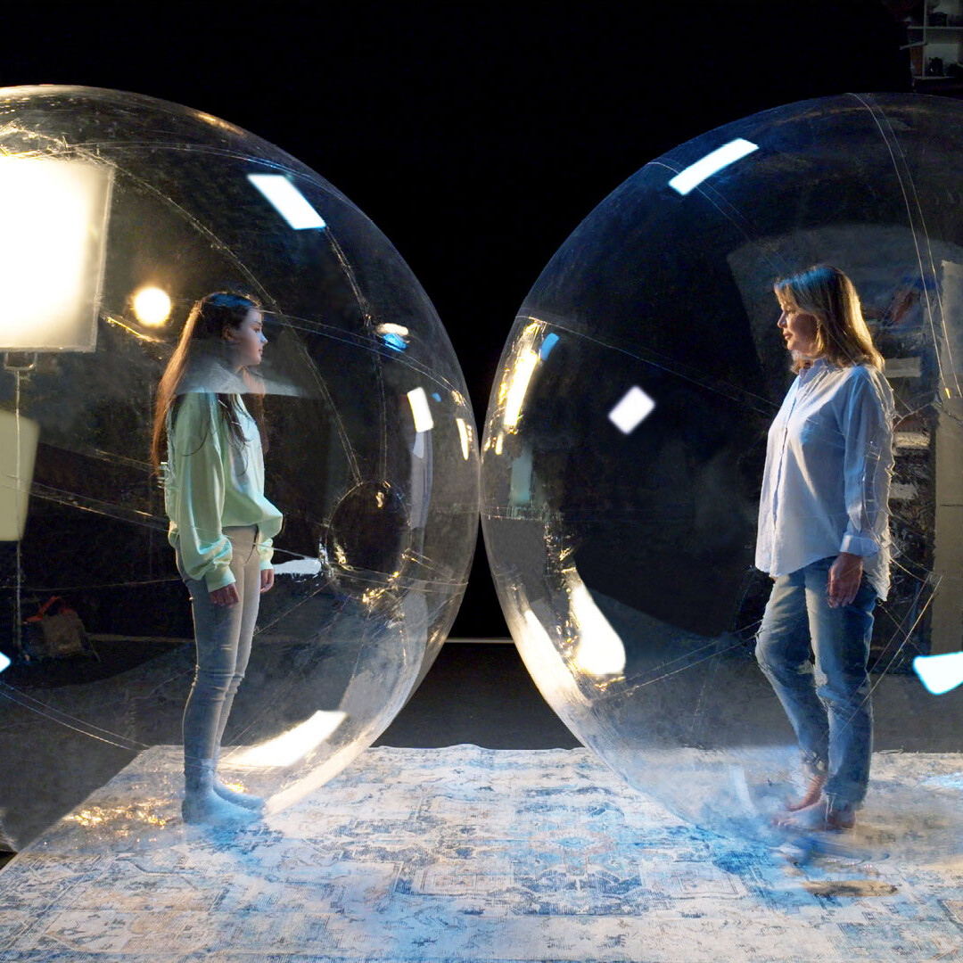 Two women in bubbles