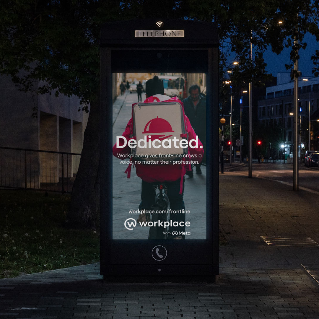 Workplace advert on a phonebooth