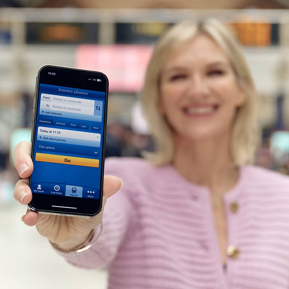 Woman showing a mobile phone with app