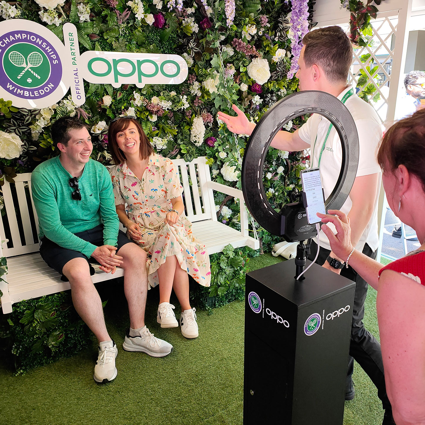 Two people getting their photo taken