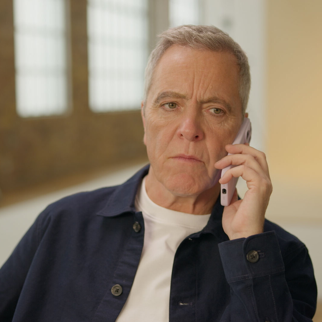 James Nesbitt on a phone