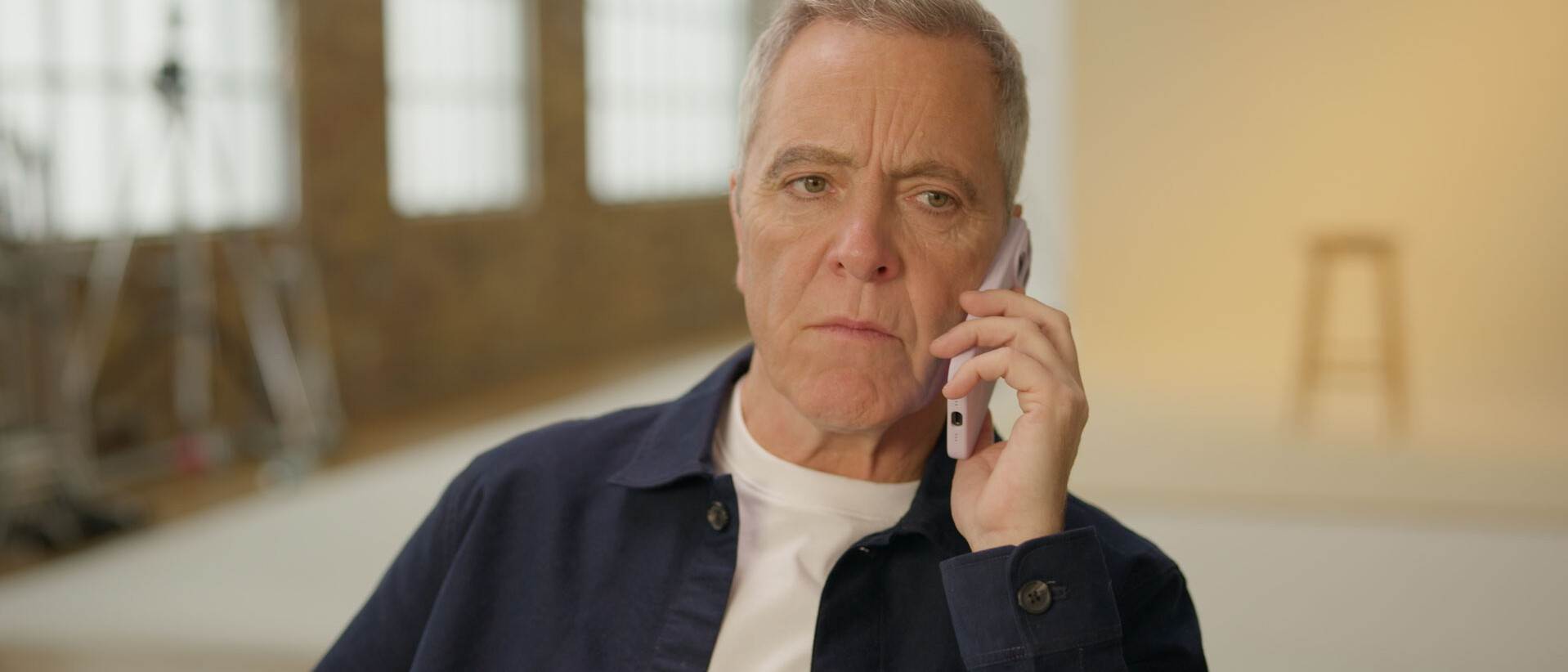 James Nesbitt on a phone